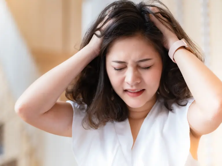 Head pain treatment at rehabilitation clinic. Physical therapy for pain relief and mobility recovery after work injury